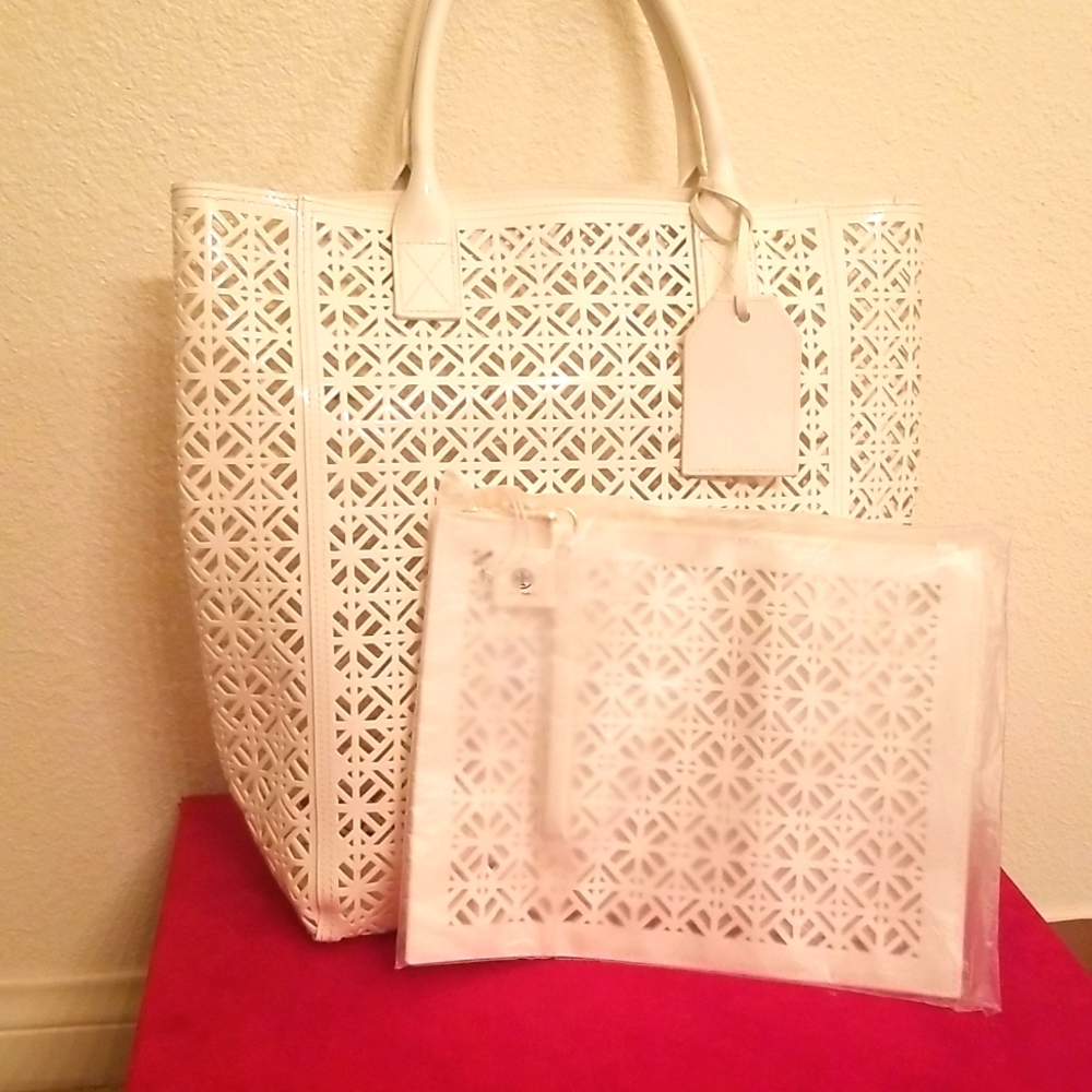 Tory burch  laser cut shopper tote and clutch set..